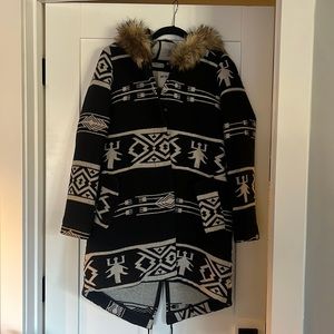 Back and white southwest print coat with fur hood